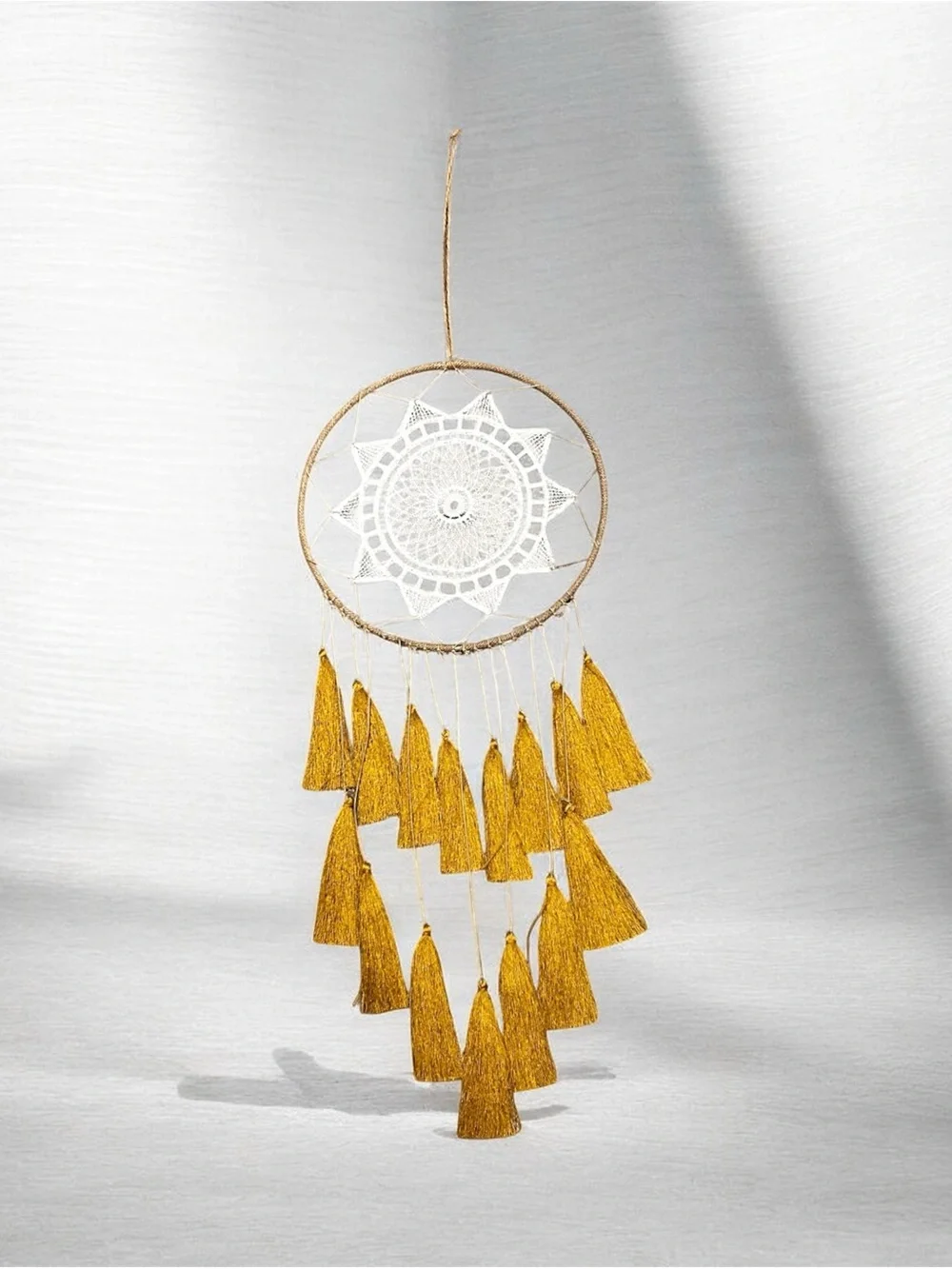 Artilady macrame dream catcher features a white mandala web